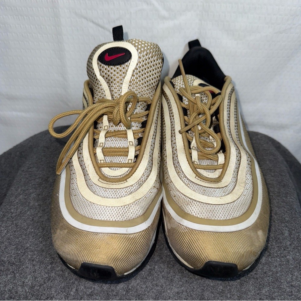 Nike Gold and White Athletic Shoes with Wave Design